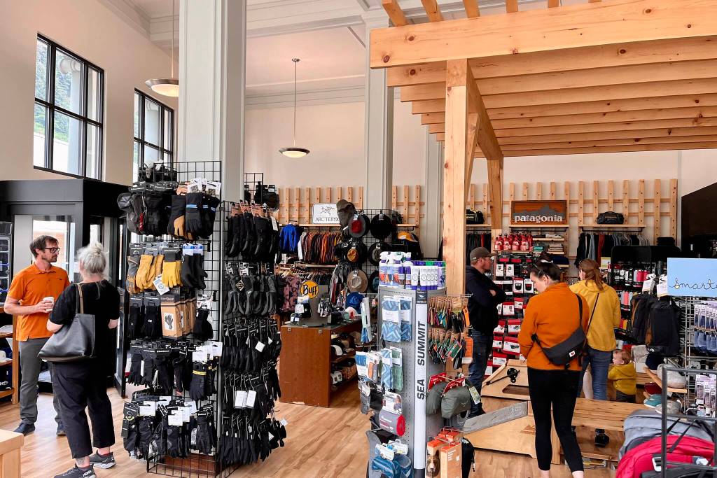 Foggy Mountain Shop co-owner Sean Rielly greets customers in new location. (Jonson Kuhn / Juneau Empire)