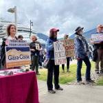 Crowd holding signs and showing solidarity at Saturdays rally. (Jonson Kuhn / Juneau Empire)