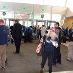 People pass through a U.S. Secret Service security check upon entering the Alaska Airlines Center for Saturdays rally. The photographer was sent away from the entrance by a rally media official shortly after this picture was taken. (Mark Sabbatini / Juneau Empire)