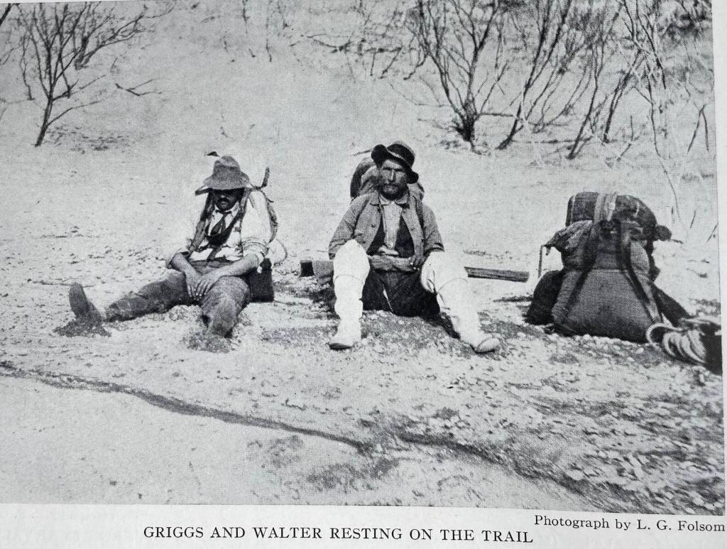 Robert Griggs, left, and Walter Metrokin of Kodiak rest during a 1916 expedition into the Valley of 10,000 Smokes on the Alaska Peninsula. (L.G. Folsom, from the book The Valley of 10,000 Smokes by Robert Griggs)