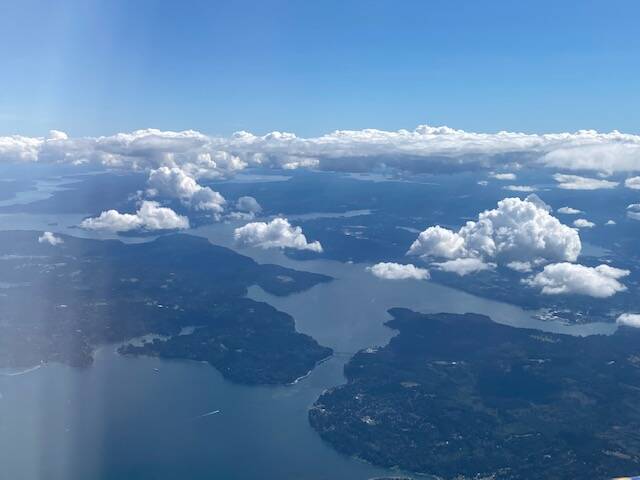Fair weather cumulus clouds float over the Alaska landscape seen on July 8. (Courtesy Photo / Denise Carroll)