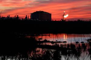 A flare burns at Venture Global LNG in Cameron, La., on April 21, 2022. Most major countries are finding it easier to promise to fight climate change than actually do it. (AP Photo / Martha Irvine)