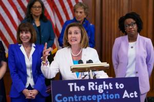 Speaker of the House Nancy Pelosi, D-Calif., makes a point during an event with Democratic women House members and advocates for reproductive freedom ahead of the vote on the Right to Contraception Act, at the Capitol in Washington, Wednesday, July 20, 2022. She is flanked by Rep. Kathy Manning, D-N.C., and Rep. Lauren Underwood, D-Ill. Democrats are pushing legislation through the House that would inscribe the right to use contraceptives into law. (AP Photo/J. Scott Applewhite)