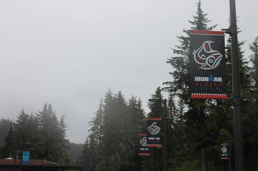 Ironman Alaska flags line the walkways at the University of Alaska Southeast. (Clarise Larson / Juneau Empire)