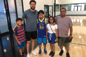 The Tagaban family, Jacob, Jessielea, Joseph and Ed, pose with Klay Thompson of the Golden State Warriors thanks to the Make a Wish Foundation. (Courtesy photo / Ed Tagaban)