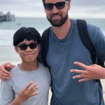 Joseph Tagaban and Klay Thompson hold up four fingers to represent Thompsons four championships won with the Golden State Warriors. (Courtesy photo / Tagaban family)