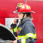 Capt. Anne Wilcock of Capital City Fire/Rescue coordinates the departments response to a simulated airplane crash during an exercise at Juneau International Airport on July 23, 2022. (Michael S. Lockett / Juneau Empire)