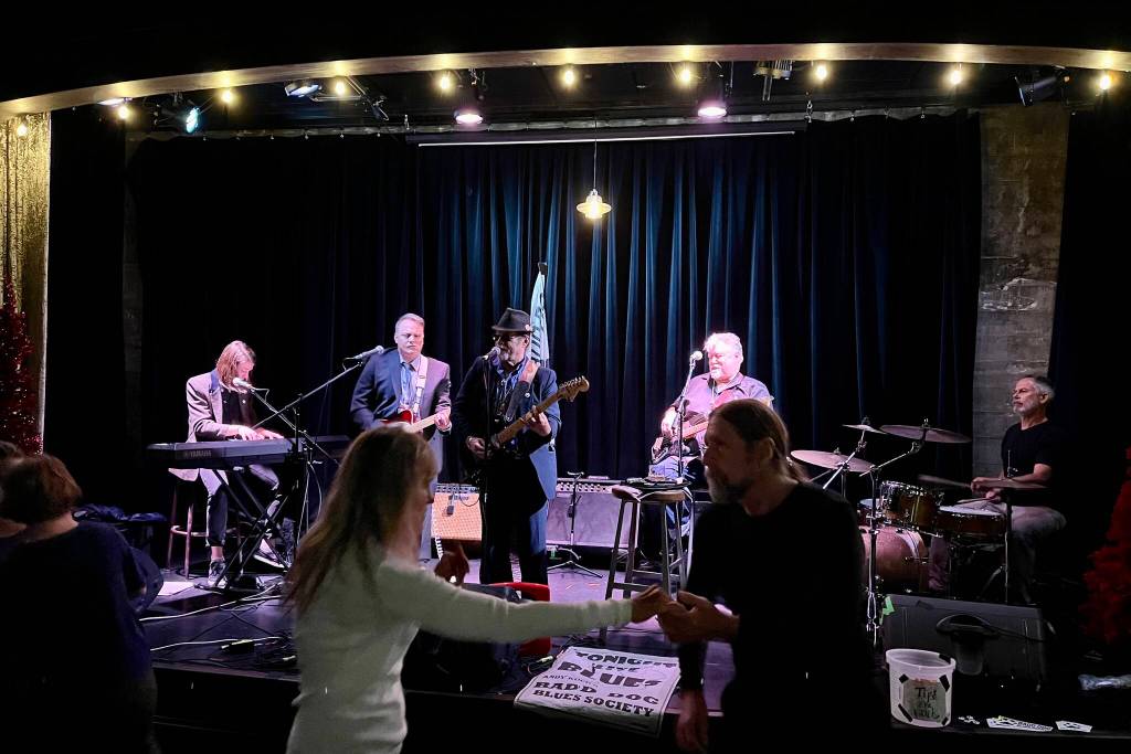 Andy Badd Dog Koch and his band Badd Dog Blues Society closed out the evening with the dance floor in full swing at the Crystal Saloon Saturday night. (Jonson Kuhn / Juneau Empire)