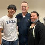 Jonson Kuhn / Juneau Empire 
The Doogan family: Isaac, Neil and Alma pose behind the counter of their family-operated business J&J Deli and Asian Market. The family has decided to stay in business for one more year and continue the search for a new buyer.