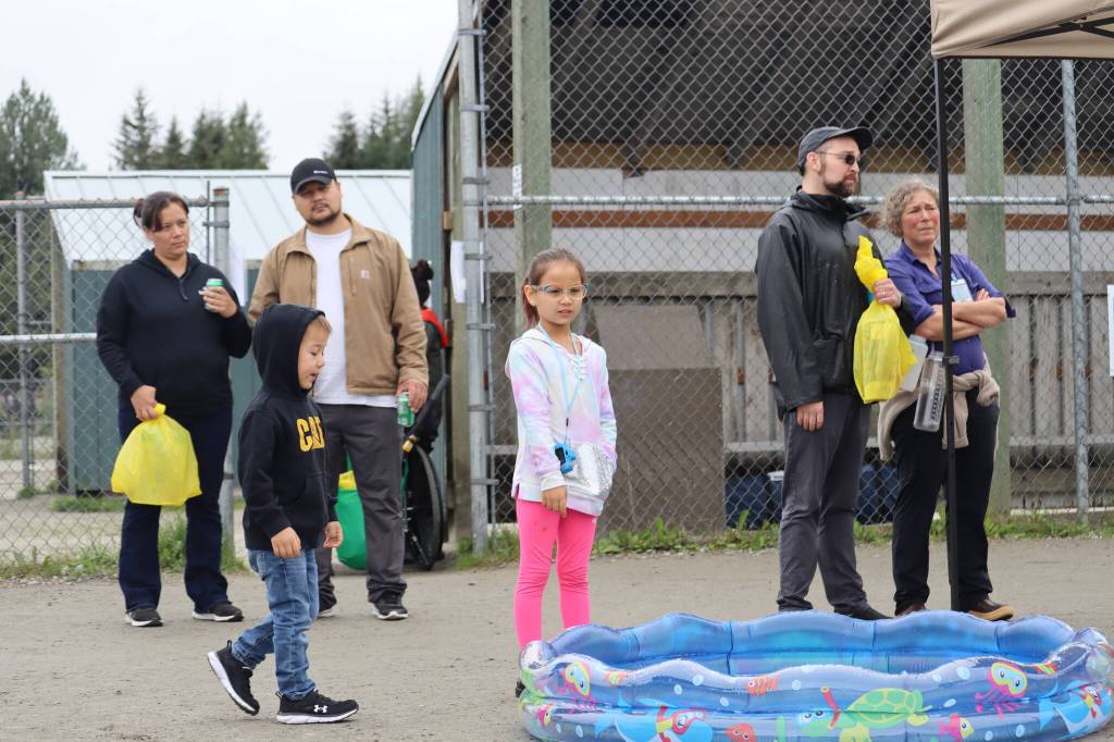 The SAFE Child Advocacy Centers Day at the Park provided not only access to resources but also child-friendly activities such as capture the flag, corn hole, bouncy house, as well as free food. (Jonson Kuhn / Juneau Empire)