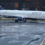 Deltas Boeing 737 lands onto a Juneau International Airport runway after a flight from Seattle. (Jonson Kuhn / Juneau Empire)