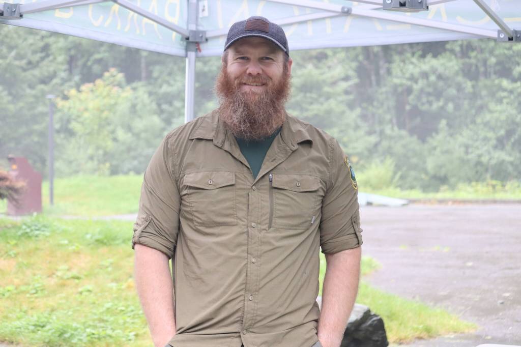 Park Ranger Austin Burnett was stationed at Cope Park with snacks for community members within the surrounding neighborhoods walking dogs or passing by through the park. (Jonson Kuhn / Juneau Empire)