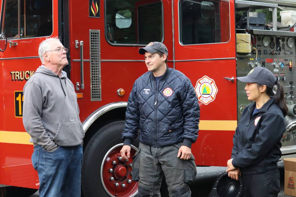 Capital City Fire and Rescue also made appearances throughout National Night Out at each neighborhood and spoke at length with community members. Photo taken on Skywood Lane. (Jonson Kuhn / Juneau Empire)