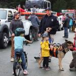 Kids got a firsthand experience at meeting with first responders and their K-9 companions at National Night Out. Photo taken on Rivercourt Way. (Jonson Kuhn / Juneau Empire)