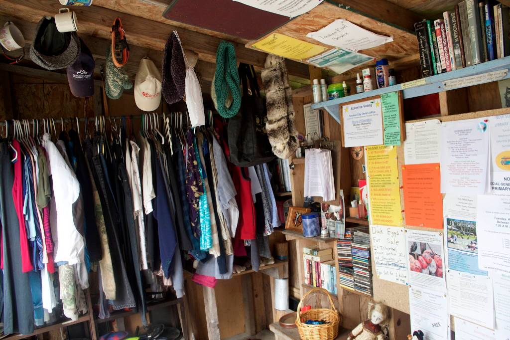 The bus stop in the center of Tenakee Springs is a drop-off and pickup exchange for clothes, books, kitchen items, building materials and other items, along with one of the many places community notices are posted. Tenakee doesnt have a waste disposal facility so, with the number of commercial businesses dwindling to near none, making use and reuse of any items is common. (Mark Sabbatini / Juneau Empire)