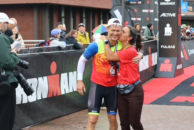 Scott and Amy Gende from Juneau celebrate after the inaugural Ironman Alaska. (Jonson Kuhn / Juneau Empire)