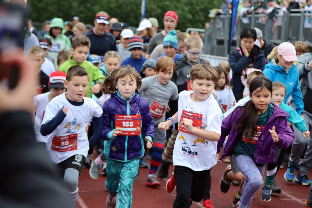 And theyre off. Children exert effort near the starting line of a fun run Saturday during the Ironkids Alaska event. (Ben Hohenstatt / Juneau Empire)