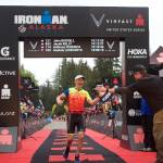 John Bursell, 58, a Juneau resident and veteran of more than 20 Ironman races, finishes the Ironman Alaska with a time of 10:13:20. He was hailed by the race announcer as the first Juneauite to cross the finish line, which occurred because he was among the earliest of the participants who had staggered starting times, although he actually finished about 10 minutes slower than the fastest local resident. (Mark Sabbatini / Juneau Empire)
