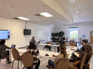 Clarise Larson / Juneau Empire 
Aaron Surma, the executive director for National Alliance on Mental Illness Juneau and the Juneau Suicide Prevention Coalition, leads a safety plan workshop Tuesday night hosted by NAMI and the Juneau Suicide Prevention Coalition. The workshop was a collaborative brainstorming session with Juneau residents about how to create a safety plan that people can use to help someone who is experiencing a mental health or suicide crisis.