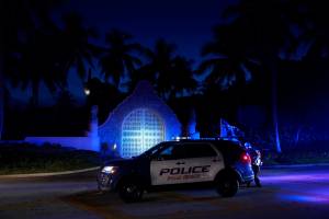 Police stand outside an entrance to former President Donald Trump's Mar-a-Lago estate, Monday, Aug. 8, 2022, in Palm Beach, Fla. Trump said in a lengthy statement that the FBI was conducting a search of his Mar-a-Lago estate and asserted that agents had broken open a safe. (AP Photo / Wilfredo Lee)