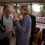 Supporters of U.S. Sen. Lisa Murkowski wait for an opportunity to talk to her at her newly Juneau campaign headquarters Thursday evening at Kootznoowoo Plaza. (Mark Sabbatini / Juneau Empire)