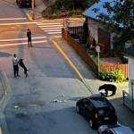 A resident of downtown posted a series of photos on "Juneau Bear sightings” Facebook page that showed a bear eating garbage in the area on Thursday evening. According to the source, no amount of noise was able to scare the bear away from the area. (Courtesy / Angelique Buzzek)