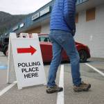 A resident walks to the Mendenhall Mall precinct to cast their vote for this years atypical election day. (Clarise Larson / Juneau Empire)