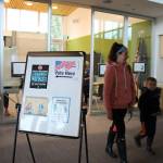 A family walks out of the Mendenhall Valley Public Library after casting their ballots on this years Election Day for the special general election and a regular primary election. (Clarise Larson / Juneau Empire)