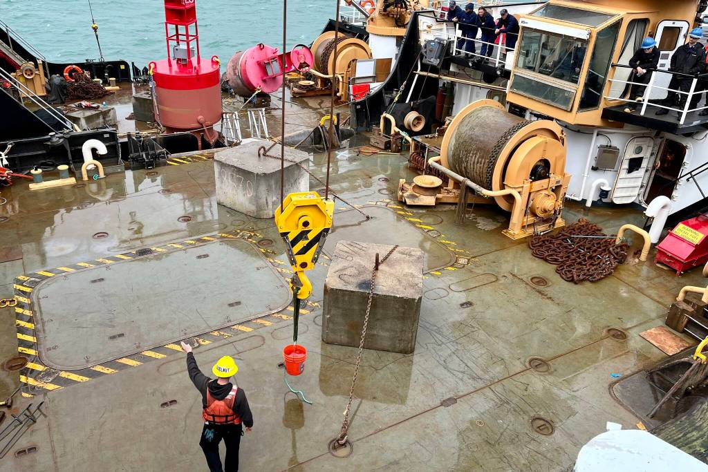 Another one of the games held at the Buoy Tender Olympics was boom spot, which consists of each team moving a bucket of water with a crane from various locations without spilling it. (Jonson Kuhn / Juneau Empire)