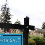 A for sale sign sits outside a house in the Mendenhall Valley area. The City Borough of Juneaus finance staff recently released an online FAQ dedicated to answering a series of frequently asked questions about the boroughs real estate mandatory disclosure policy. (Clarise Larson / Juneau Empire)