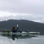 Steven Ireland-Haight sits in his kayak as he continues his journey traveling across the country to raise awareness about climate change. Born and raised in Juneau, Ireland-Haight said the capital city is what nurtured his love for the outdoors. (Courtesy / Owen Squires)