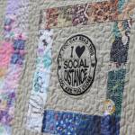 Jonson Kuhn / Juneau Empire
Stich-Smiths mother Candace Leonard helped him with the embroidery designs that he then sewed into one large quilt, using fabric from pandemic masks along the outer edges.