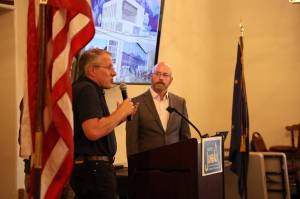 Bruce Abel, the president of Don Abel Building Supply, raises his hand to ask City and Borough of Juneau Assembly member Wade Bryson a question at his speech at the Greater Juneau Chamber of Commerce luncheon on Thursday. Abel said he doesnt follow the math Bryson laid out in the presentation, and said he finds a problem with the lack of clarity and information being given to the public on such a large-scale topic. (Clarise Larson / Juneau Empire)