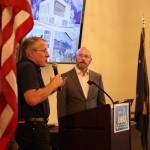 City and Borough of Juneau Assembly member Wade Bryson looks to principal architect at NorthWind Architects, Sean Boily as he speaks in favor of the building of a new city hall. The proposed building would move the location of the current city hall over to Whittier Street, across the street from the state museum. The total project is estimated to cost around $41.3 million, which would require the $35 million bonds along with $6.3 million to be pulled from general funds, an amount that the Assembly has already allocated. (Clarise Larson / Juneau Empire)