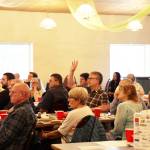 City and Borough of Juneau Assembly member Wade Bryson looks to principal architect at NorthWind Architects, Sean Boily as he speaks in favor of the building of a new city hall. The proposed building would move the location of the current city hall over to Whittier Street, across the street from the state museum. The total project is estimated to cost around $41.3 million, which would require the $35 million bonds along with $6.3 million to be pulled from general funds, an amount that the Assembly has already allocated. (Clarise Larson / Juneau Empire)