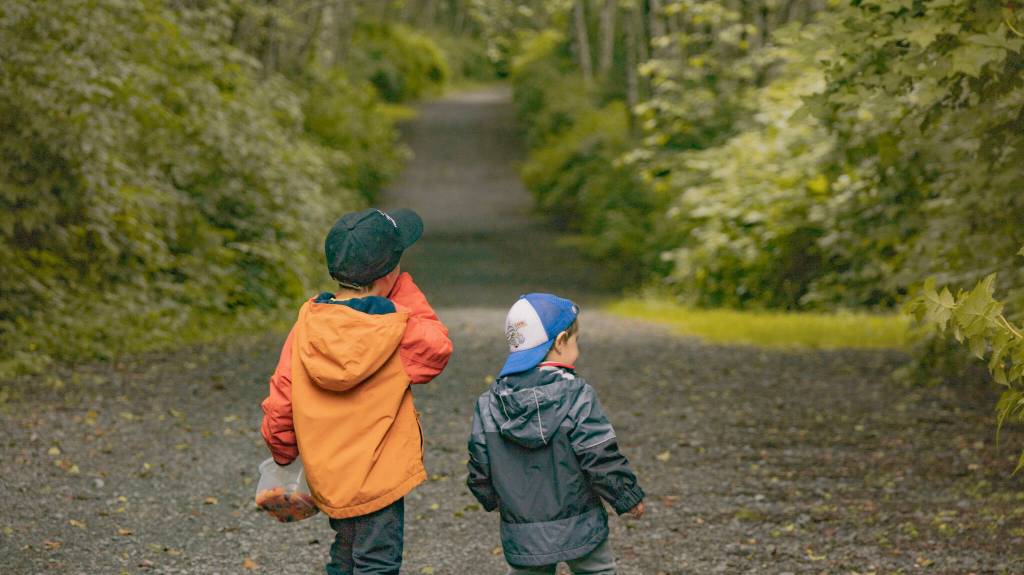 Kai and Ryder taste a few berries on their way looking for more. (Courtesy Photo / Ḵaa Yahaayí Shkalneegi Muriel Reid)