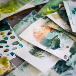 Paintings lay scattered across Goades studio in preparation for Berry Song. (Courtesy Photo / Bethany Goodrich)