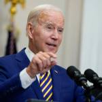 President Joe Biden speaks about student loan debt forgiveness in the Roosevelt Room of the White House, Wednesday, Aug. 24, 2022, in Washington. Education Secretary Miguel Cardona listens at right. (AP Photo / Evan Vucci)