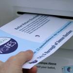 Ben Hohenstatt / Juneau Empire 
A completed ballot is dropped into the ballot drop box in the Don D. Statter Harbor parking lot on Saturday, Sept. 19, 2020.