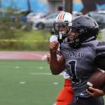 Jarrell Williams streaks down the sideline for Juneau's second touchdown of the game. The Huskies are now 3-0 on the season with each win coming against other Cook Inlet Conference teams. (Ben Hohenstatt / Juneau Empire)