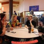 A group of new students at University of Alaska Southeast sat at the campus cafeteria before their first classes of the day began. The students said their first day is already off to a good start, and said they are excited for the rest of the semester. (Clarise Larson / Juneau Empire)