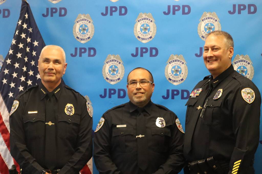 Jonson Kuhn / Juneau Empire 
From left to right, Chief of Police Ed Mercer, Officer Jim Quinto and Deputy Chief David Campbell pose for a photo at Fridays retirement ceremony for Quinto after 25 years of service. Both Mercer and Campbell gave speeches at the ceremony and spoke of Quintos integrity of character.