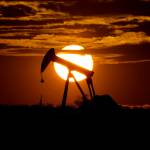The sun sets behind an idle pump jack near Karnes City, USA, April 8, 2020. Oil prices are sagging amid fears of recessions across the globe. OPEC and allied countries are weighing what to do about that when they meet online Thursday, Sept. 8, 2022. High oil prices were a bonanza for countries like Saudi Arabia over the summer, but now they're well off those highs. Saudi Arabia's oil minister has even said the group known as OPEC+ could cut production at any time. (AP Photo / Eric Gay)