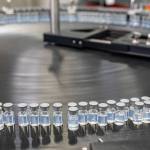 This August 2022 photo provided by Pfizer shows vials of the company's updated COVID-19 vaccine during production in Kalamazoo, Mich.  U.S. regulators have authorized updated COVID-19 boosters, the first to directly target today's most common omicron strain. The move on Wednesday, Aug. 13, 2022,  by the Food and Drug Administration tweaks the recipe of shots made by Pfizer and rival Moderna  that already have saved millions of lives.  (Pfizer)