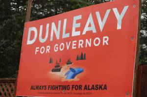 A campaign sign promoting Gov. Mike Dunleavys reelection campaign stands in Juneau. Two nonprofits on Tuesday filed a complaint with Alaska Public Offices Commission against Dunleavy and others connected to his campaign. The complaint alleges a series of egregious campaign finance violations. (Jonson Kuhn / Juneau Empire Photo)