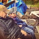 Mickey Prescott tells stories to his great grandson Jackson Pearson. (Vivian Faith Prescott / For the Capital City Weekly)