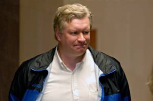 Alaska Rep. Victor Kohring, R-Wasilla, is led into the Federal Court Room for arraignment in Juneau, Alaska on Friday, May 4, 2007. Kohring, a former Alaska lawmaker who was caught up in a corruption scandal that roiled the state Legislature more than 15 years ago, has died in a vehicle crash. (AP File Photo / Chris Miller)