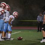 The West Valley Rams offense prepares to get set at the line of scrimmage. (Ben Hohenstatt / Juneau Empire)