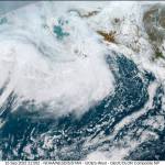 This image provided by the National Hurricane Center and Central Pacific Hurricane Center/National Oceanic and Atmospheric Administration shows a satellite view over Alaska, Thursday, Sept. 15, 2022. A vast swath of western Alaska could see flooding and high winds as the remnants of Typhoon Merbok move toward the Bering Sea region. The National Weather Service had in place coastal flood warnings, beginning Friday, spanning from parts of the Yukon Delta in southwest Alaska up to St. Lawrence Island in the Bering Sea and to the Bering Strait coast. (NOAA via AP)