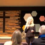 Republican U.S. Senate candidate Kelly Tshibaka answers a question during a town hall Friday evening at Juneau Christian Center. About 40 people showed up for the event, following a luncheon and door-to-door knocking in the Mendenhall Valley by Tshibaka during the afternoon. She said she plans to continue her local door-to-door campaign Saturday. (Mark Sabbatini / Juneau Empire)